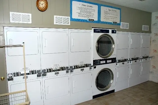 The laundry room with its bank of washers and dryers