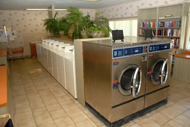 Extra-large capacity front loading machines and a book shelf in the laundry room